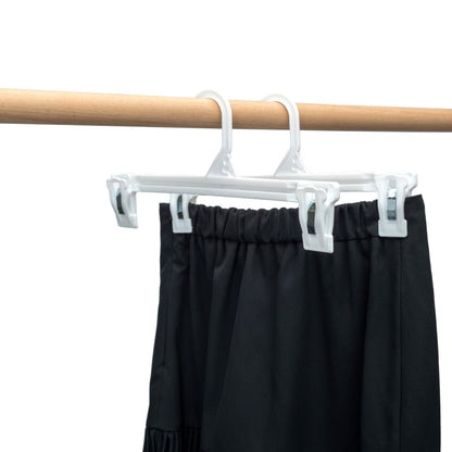 Umeraș pentru pantaloni din plastic alb cu clipsuri - ideal pentru pantaloni și fuste - HUMERO